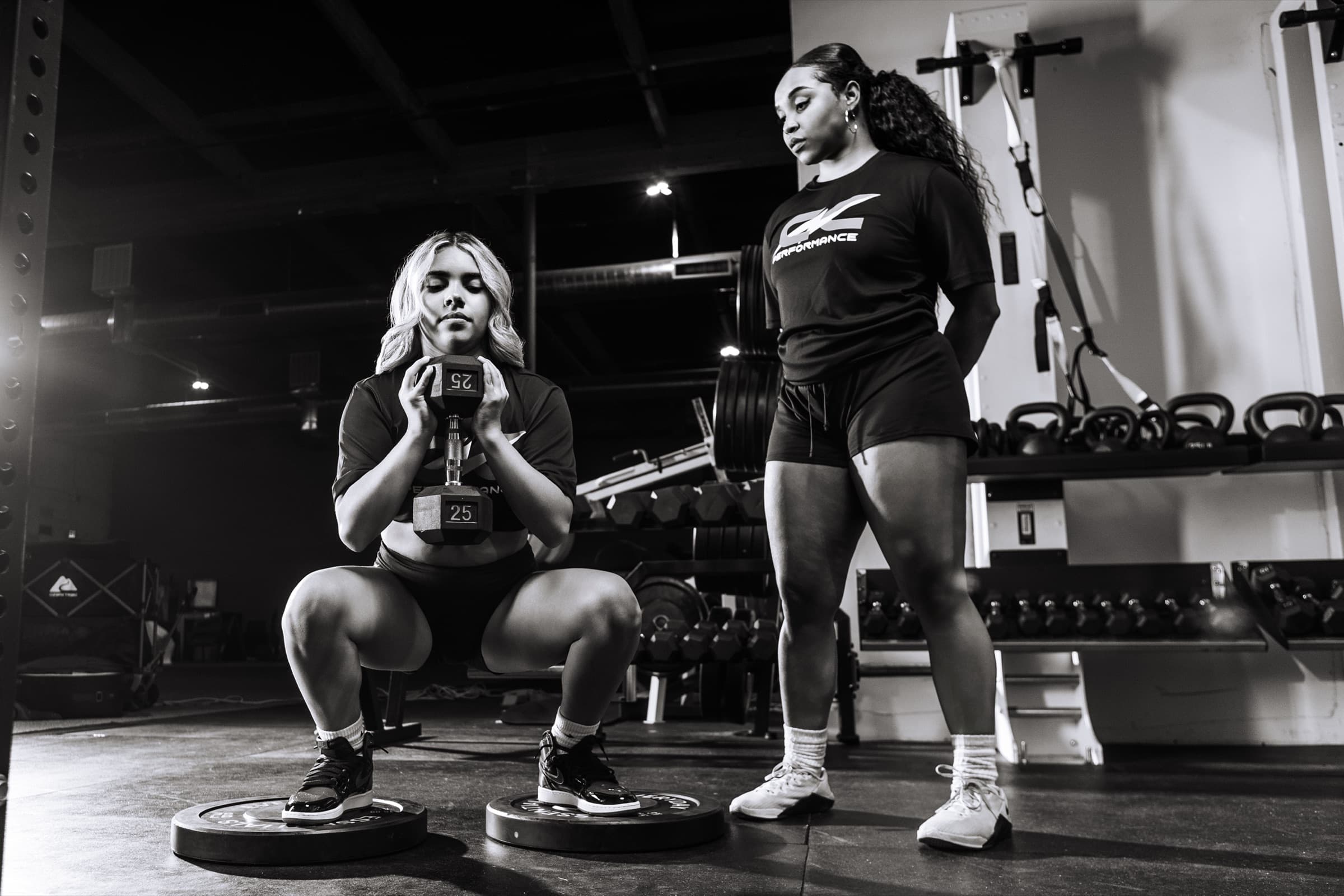 Coach Candice coaching a goblet squat